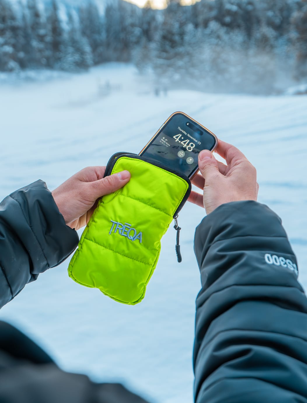 TREQA - Arctic Thermal Phone Case - Lime Green - Hands Holding with Mountain